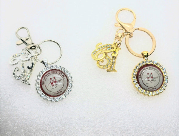 The Continentals Inc Keychain with Logo and Rhinestone Frame